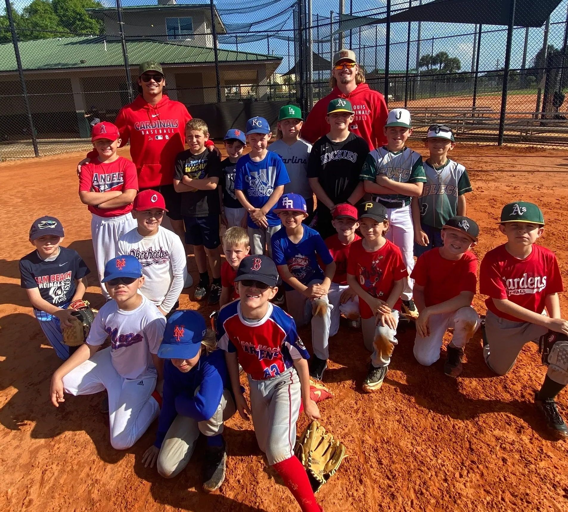 Group of kids in baseball uniforms